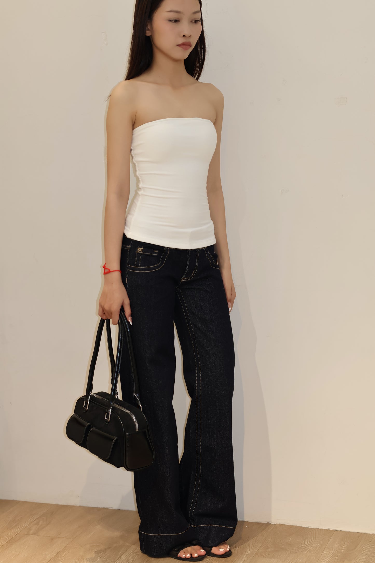 Double buttoned flared denim jeans