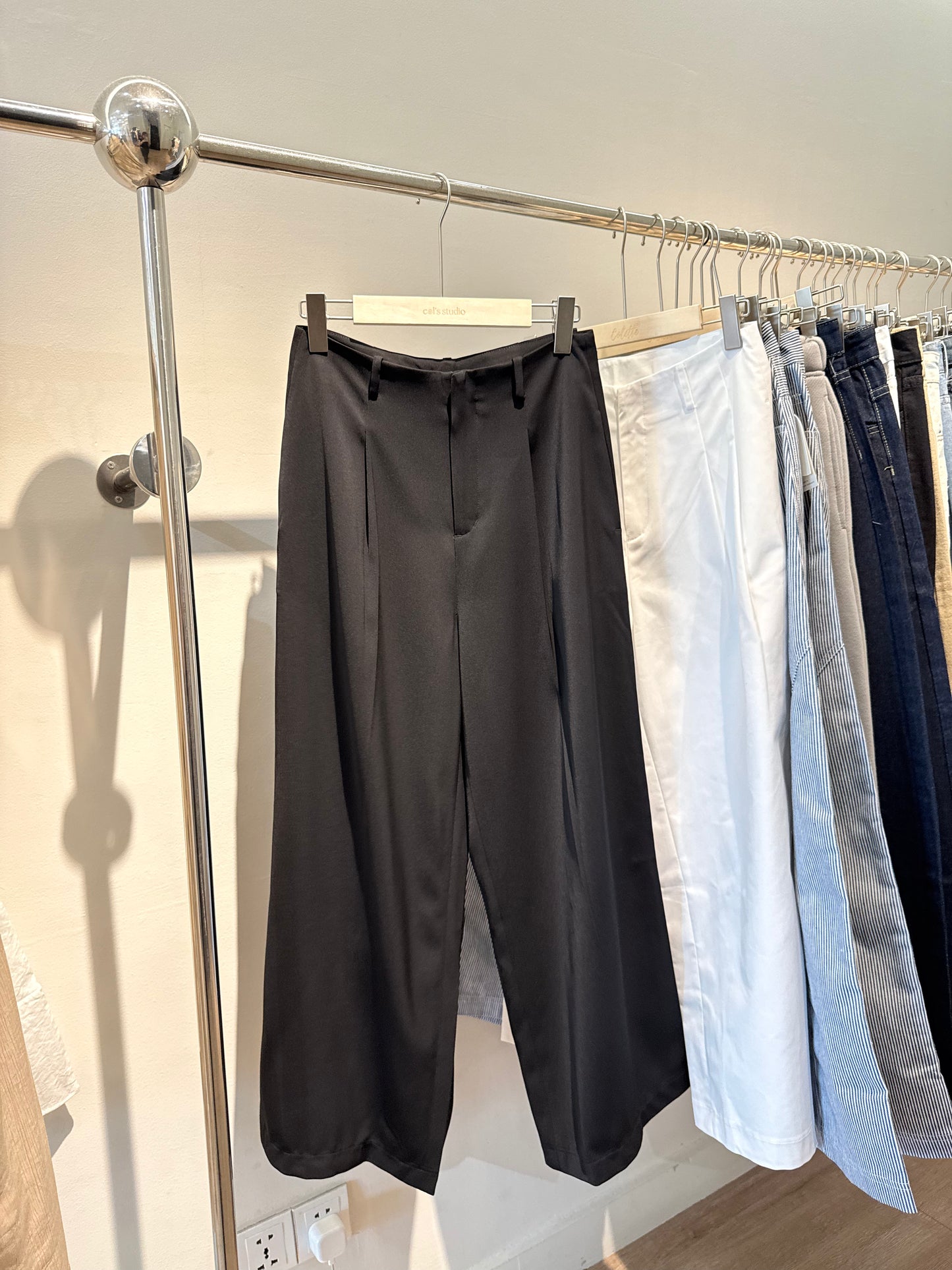 Black baggy clipped trousers