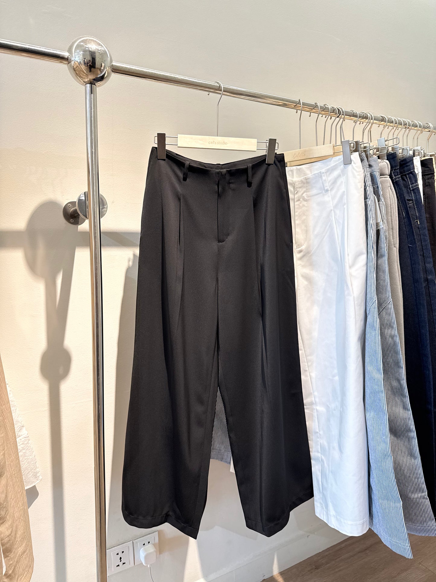 Black baggy clipped trousers