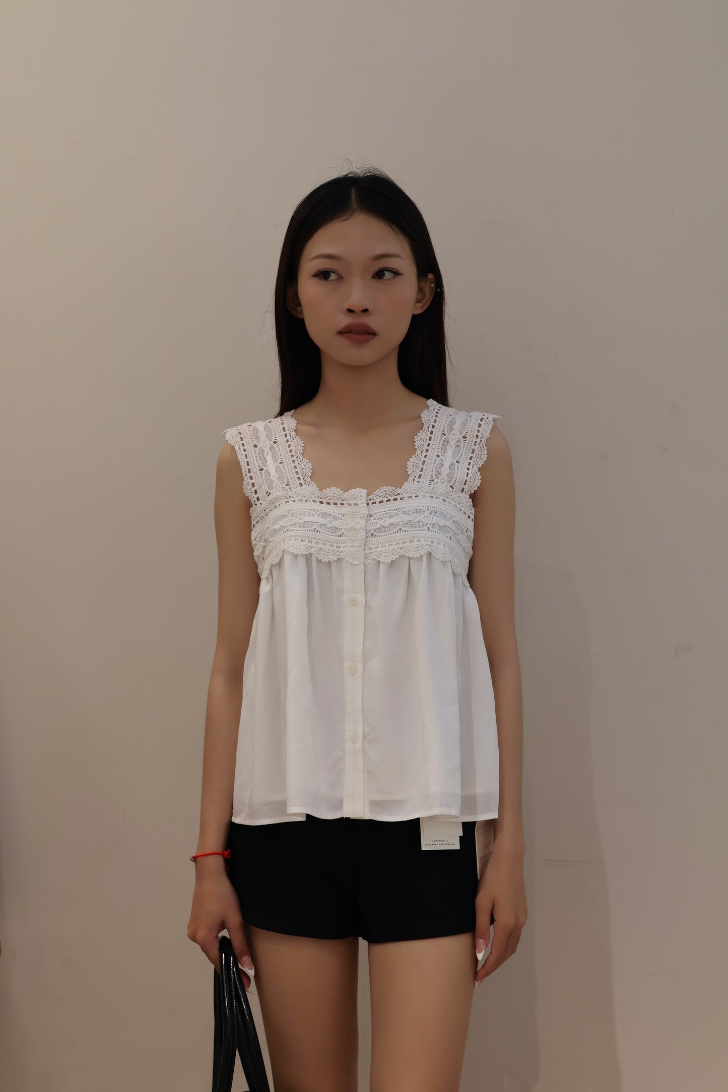 White embroidered flowy top