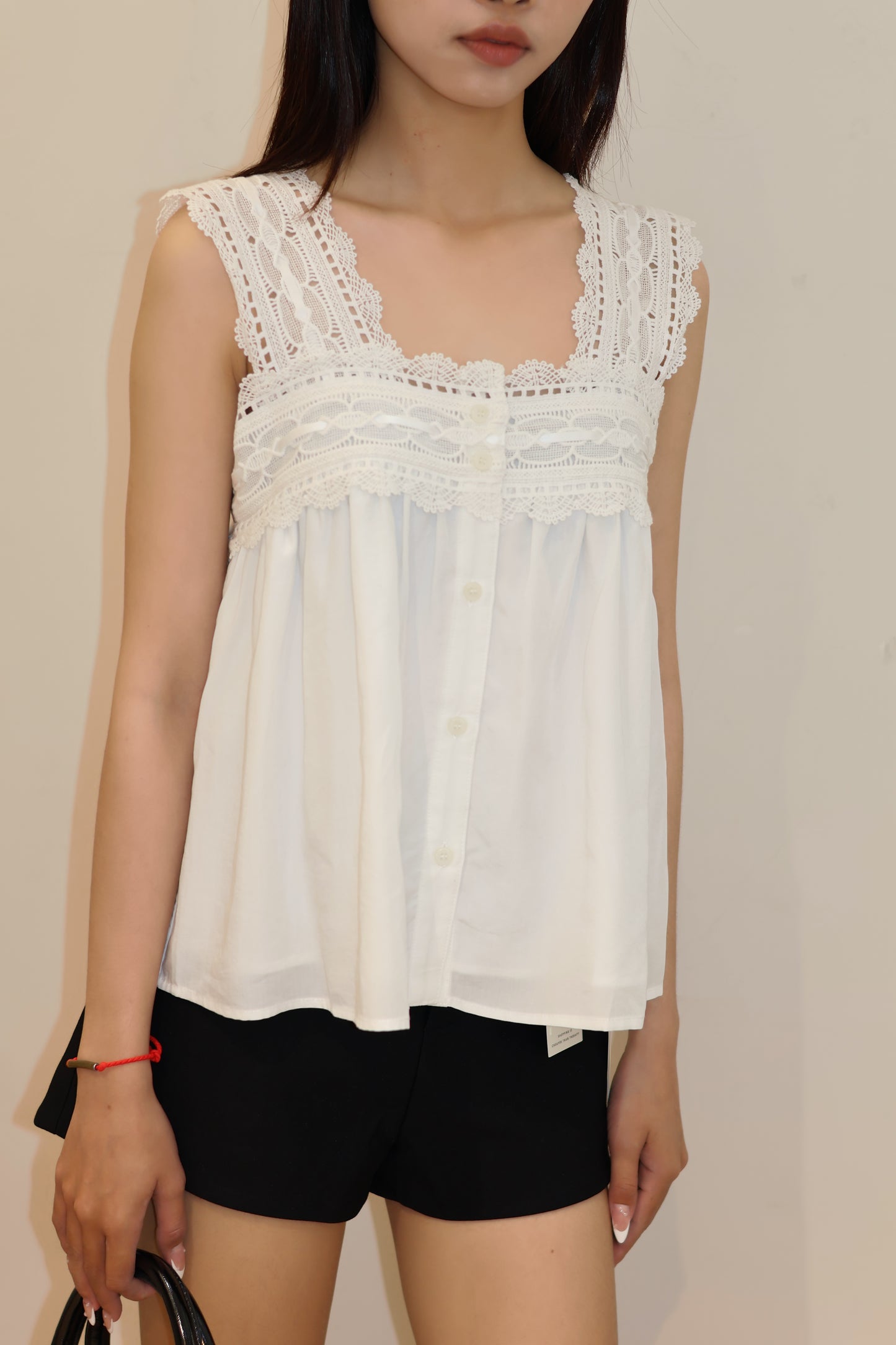 White embroidered flowy top