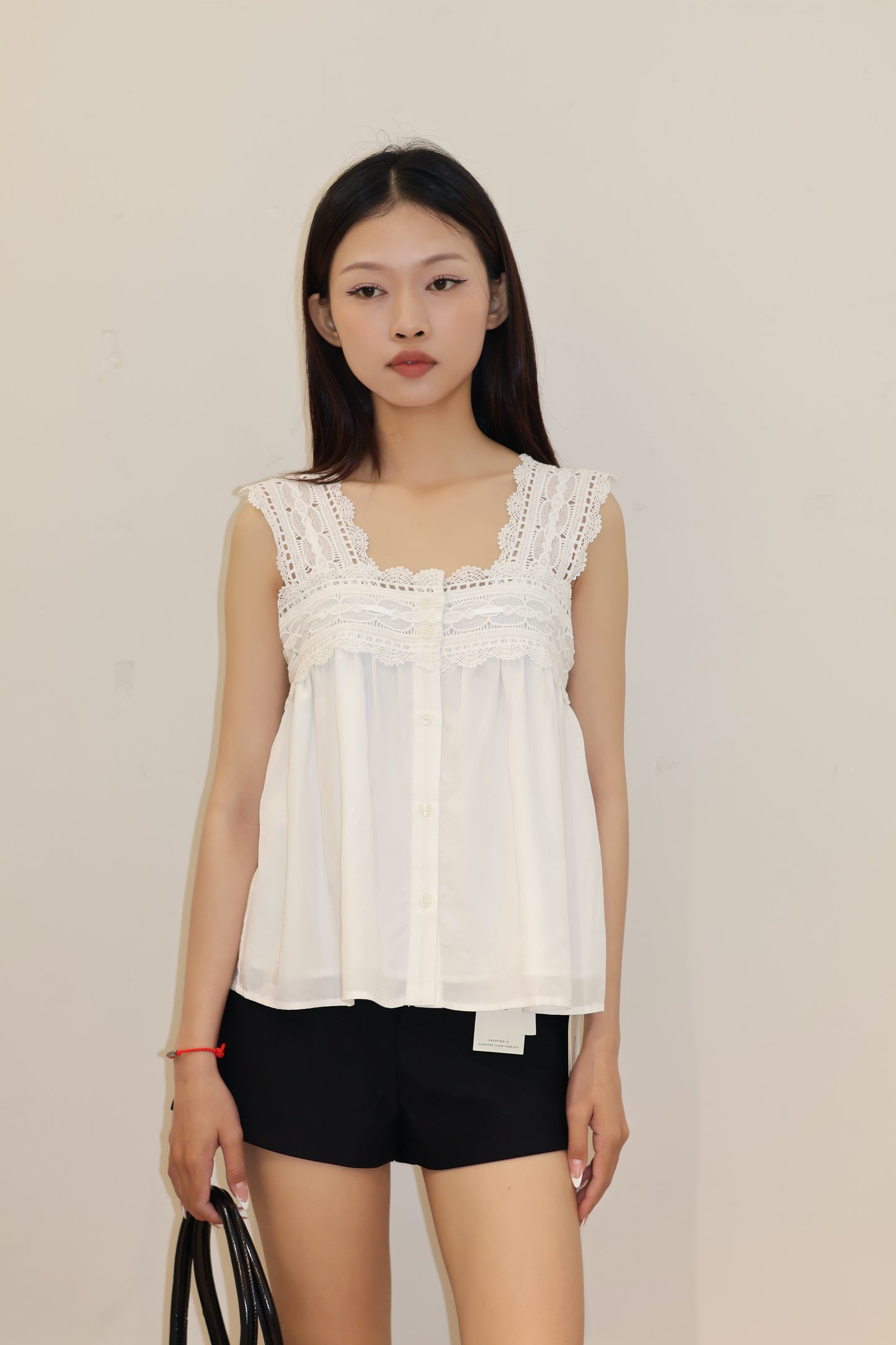 White embroidered flowy top
