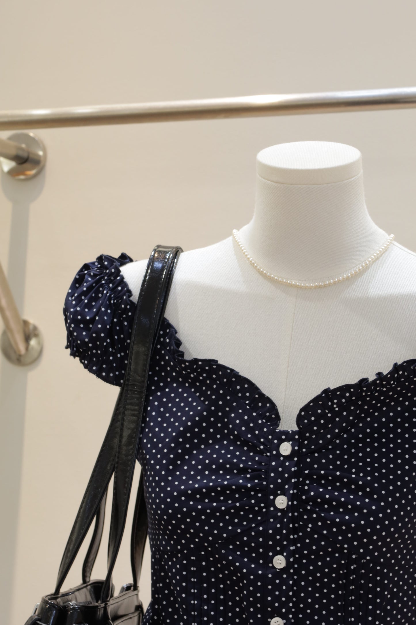 BM polkadot buttoned v top