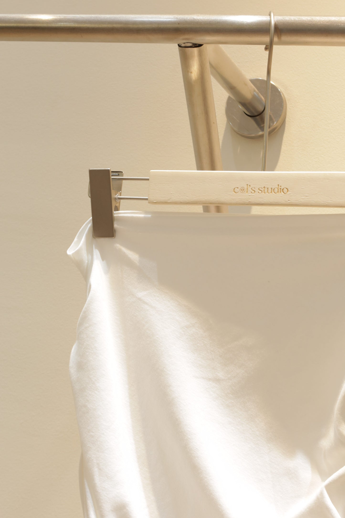 White waist cinch off shoulder