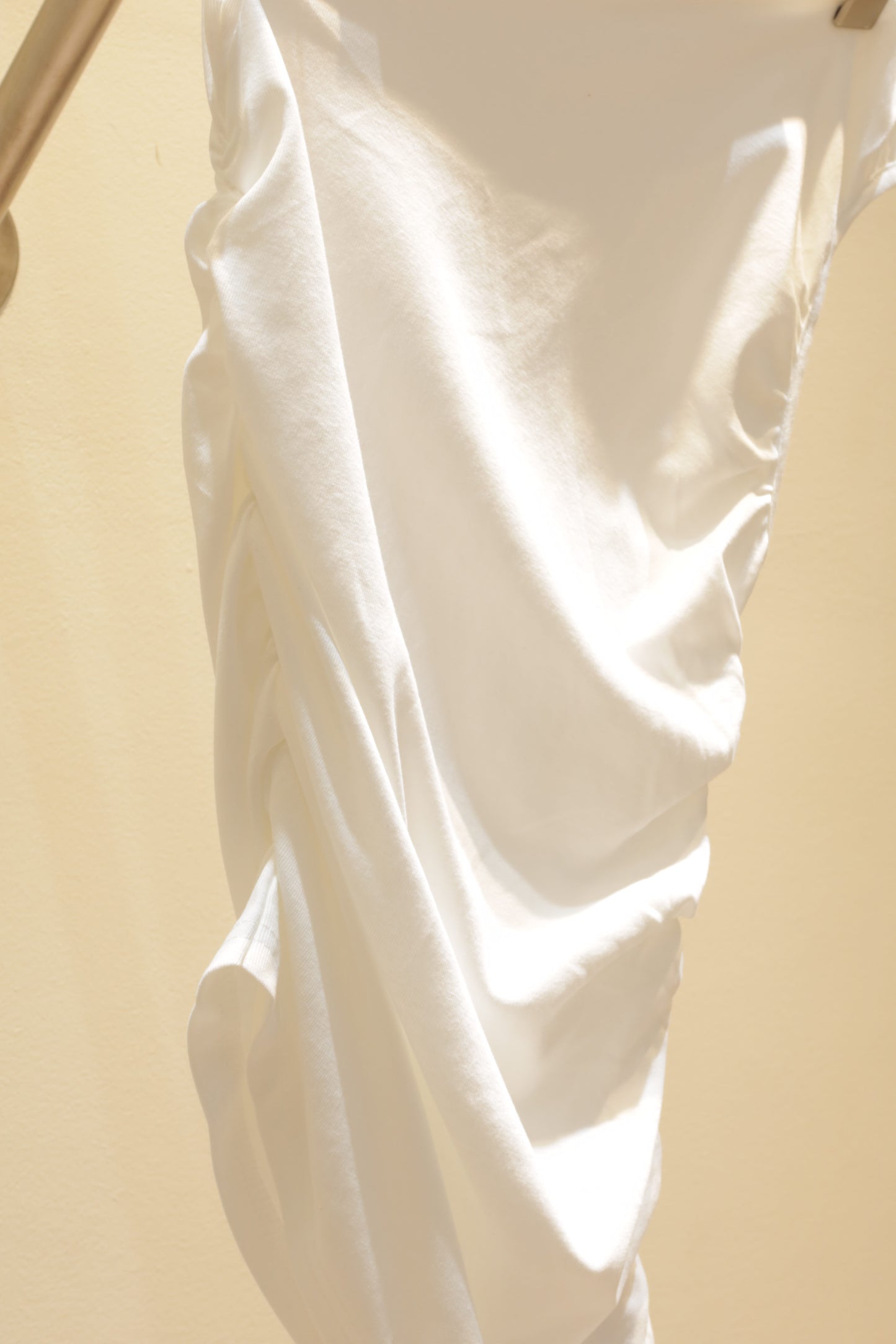 White waist cinch off shoulder